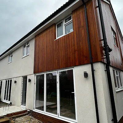 house with brown top and white area
