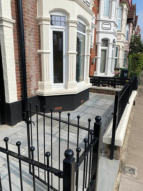 black railings outside home