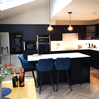 kitchen area with blue chairs